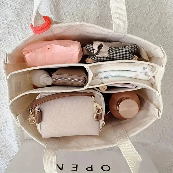 Modern och stilren unisex bärkasse. Elegant vardagsväska som accessoar för en organiserad livsstil.