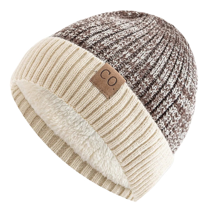 Stilren unisex Roadster mössa i stickad design, perfekt för både höst och vår.