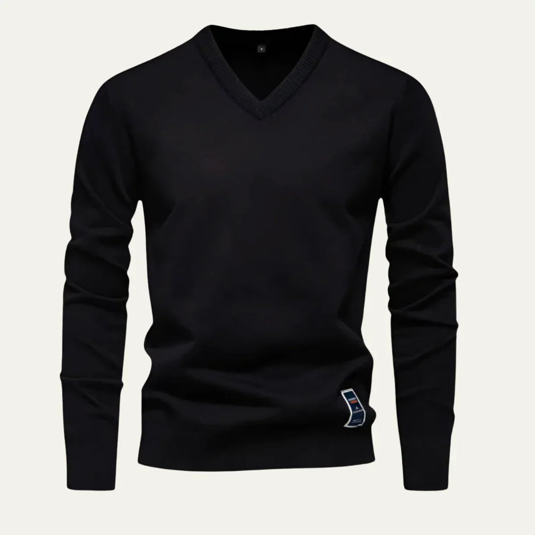 Elegant V-ringad tröja för män. En stilren herrtröja som passar för både casual och finare tillfällen.