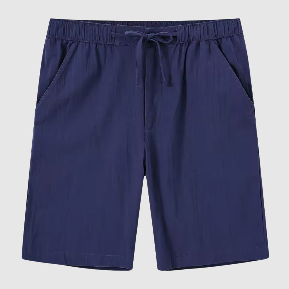 Klassiska enfärgade herrshorts för en stilren och bekväm sommarstil. Perfekt för herrmode.