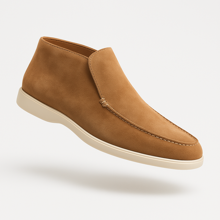 Svarta slip-on loafers för män, kombinerar elegant stil med enkelhet och komfort för både casual och formella tillfällen.