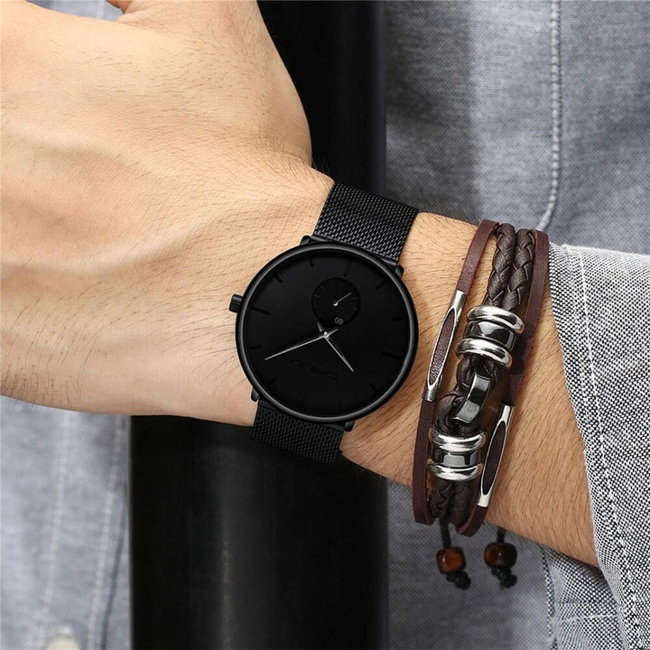 Elegant, minimalistisk herrklocka med stålblå urtavla och bekvämt PU-läderarmband.