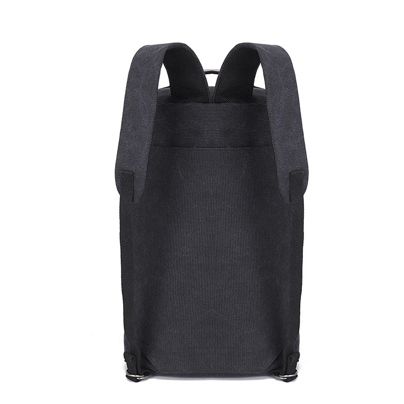 Unisex canvasryggsäck TrailHaven med stor kapacitet i grått, packad för resa, redo för äventyr och funktion.