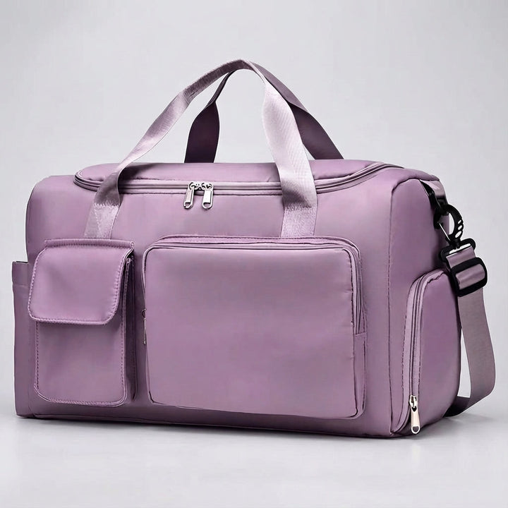 Unisex weekendväska med rymligt skofack. Många fack för organiserad packning på resor & träning.
