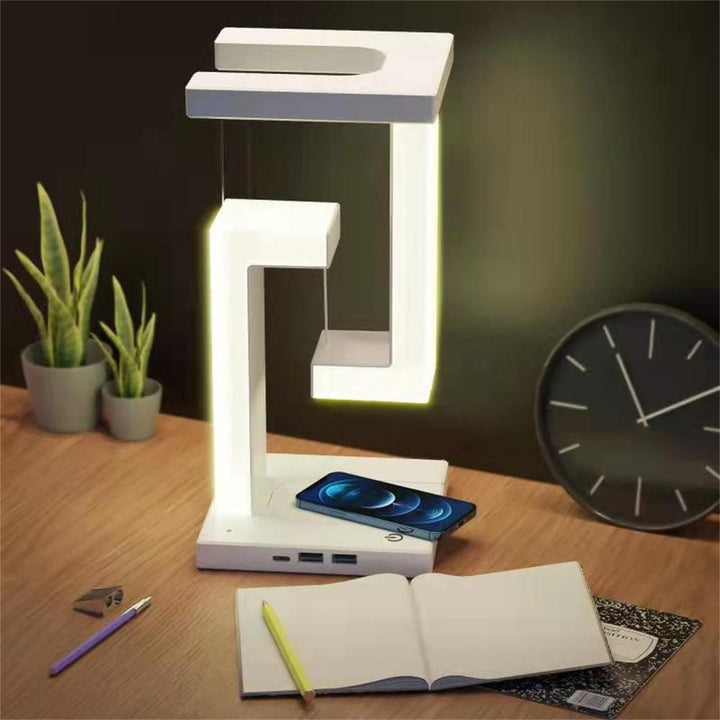 Futuristisk svävande LED-lampa med touchkontroll, idealisk som innovativ kontorslampa för arbetsplatsen.