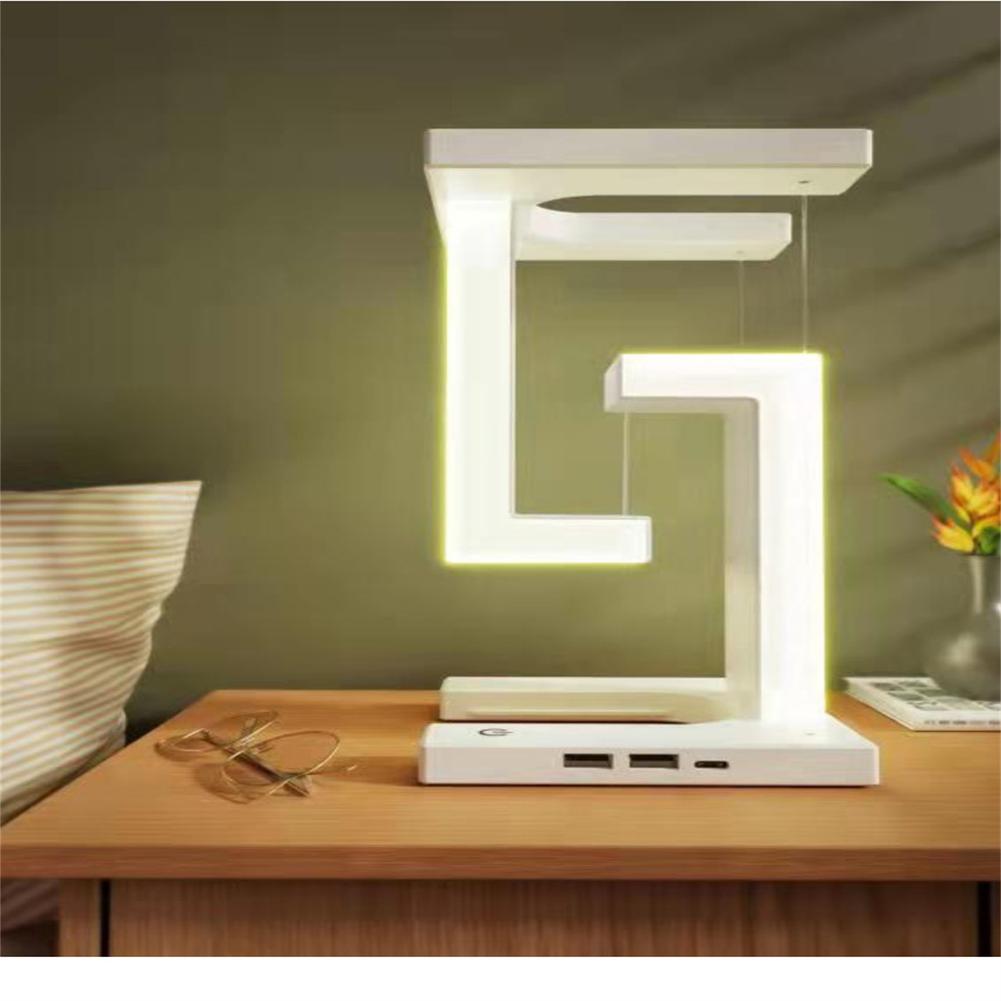 Innovativ svävande LED-skrivbordslampa; en modern gadget och perfekt presenttips med USB-laddning.