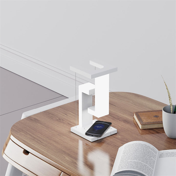 Elegant svävande LED-belysning med unik design. En stilren skrivbordslampa för moderna kontorsmiljöer.
