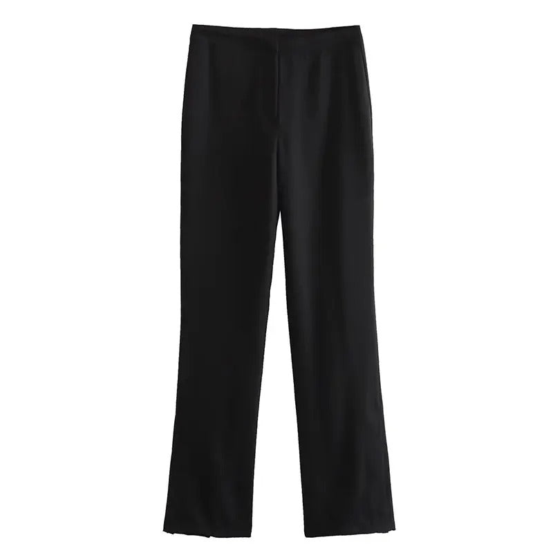 Dam axelbandslös outfit i svart. Elegant byxset för fest, kvällar och speciella tillfällen.