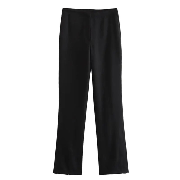 Dam axelbandslös outfit i svart. Elegant byxset för fest, kvällar och speciella tillfällen.
