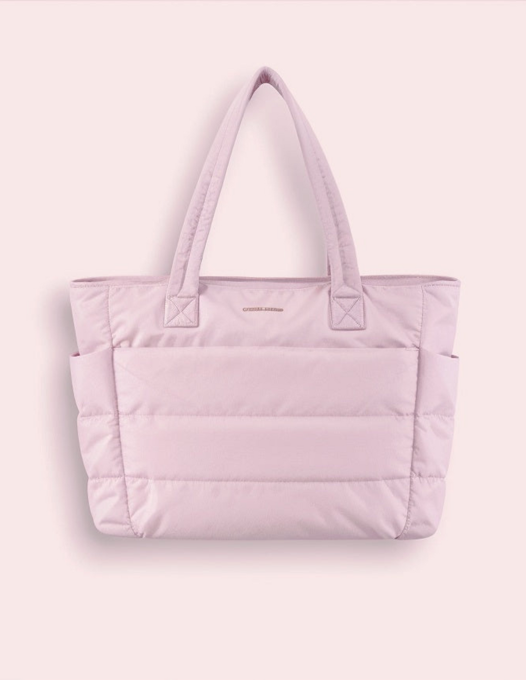 Rosa Rymlig Puffer Tote Bag. Trendig och vattentålig damväska, utmärkt för dagligt bruk.