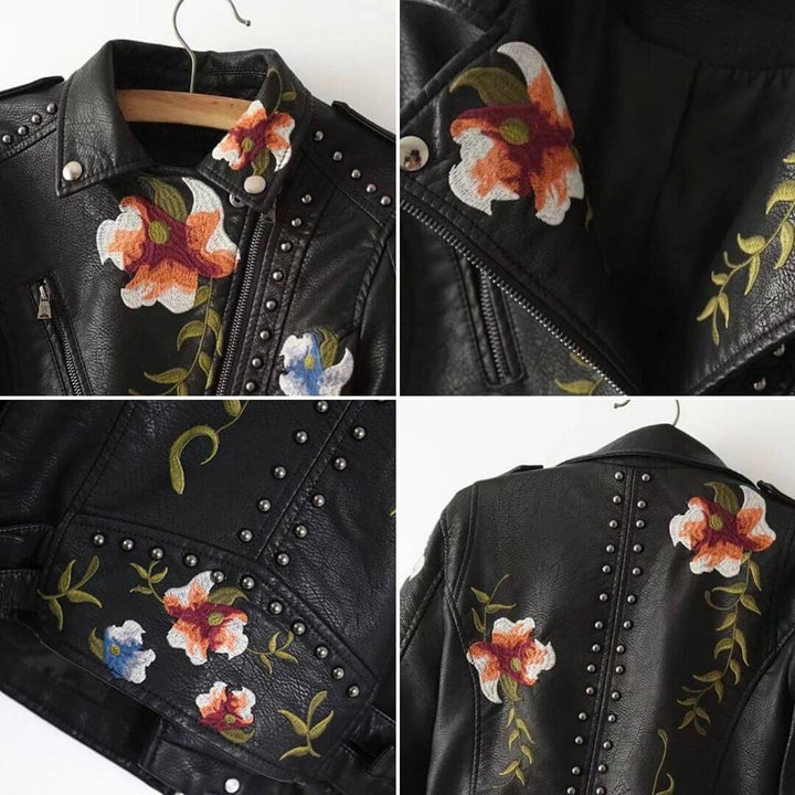 Svart damjacka, broderad med blommor, i konstläder, asymmetriskt skuren för en modern look.