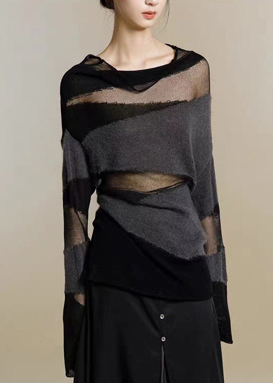 Komfortabel svart damtröja med hög krage och stilrent tyllpatchwork för höstens elegans.