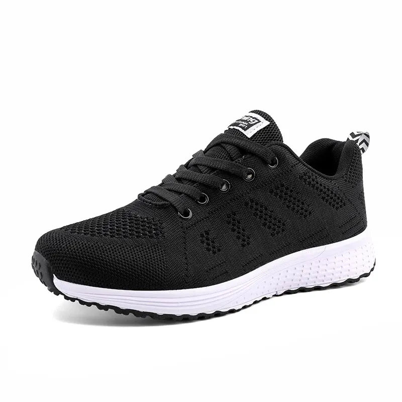 Grå lätta sneakers för kvinnor. Flexibla andningsbara promenadskor med antihalksula för komfort.