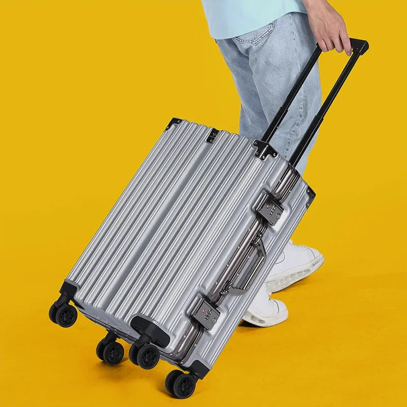 Lättmanövrerad resväska med universalhjul, säker aluminiumram och tåligt hårt skal för bagage.