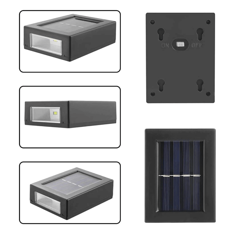 Detaljbild av svart, solcellsdriven vägglampa för uteplats. Energieffektiv LED-trädgårdsbelysning.