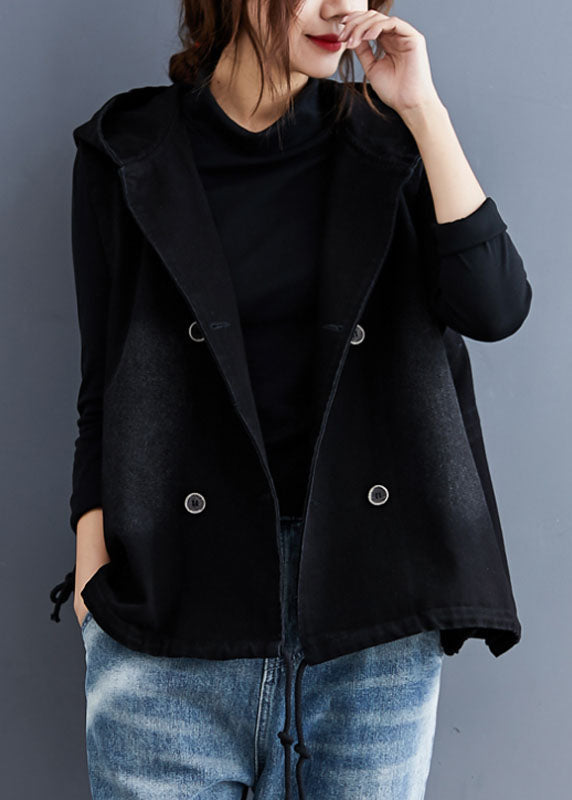 Trendig damväst i svart denimlook med huva. Ärmlös trenchväst för en stilren look, vår/höst.