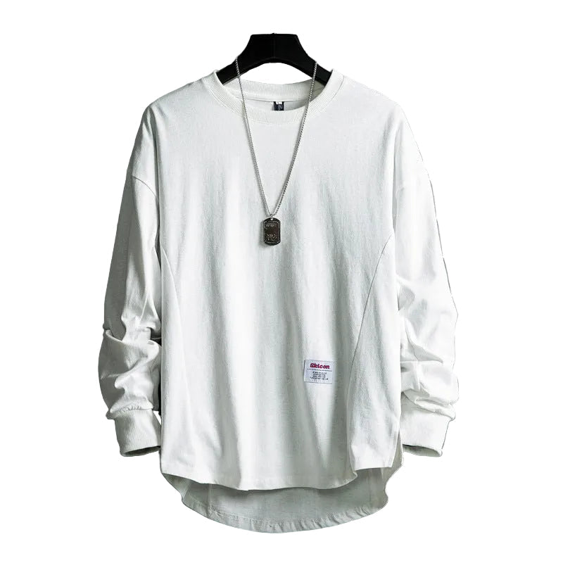Svart unisex oversized huvtröja i minimalistisk design för ultimat komfort och avslappnad stil.