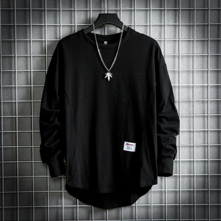 Mångsidig oversized tröja för både män och kvinnor, idealisk för en avslappnad men modern look.