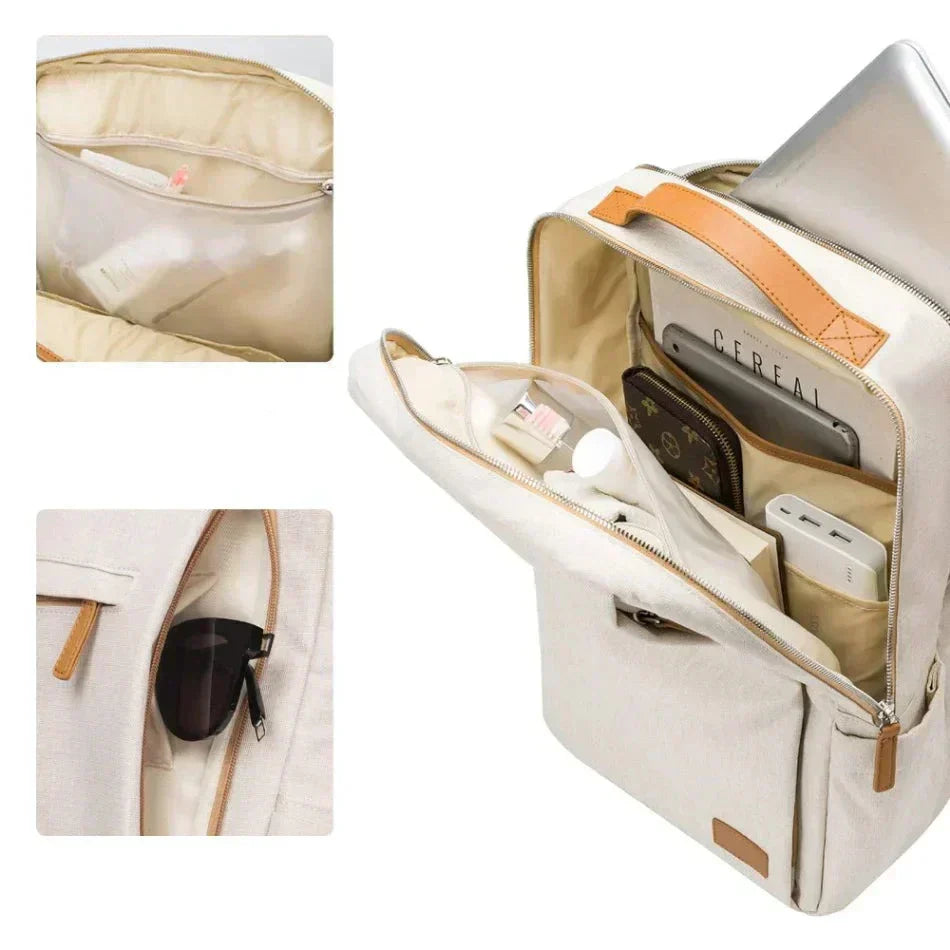 Grå modern unisex vardagsryggsäck med laptopfack. Stilren design och smart USB-laddningsfunktion för urban användning.