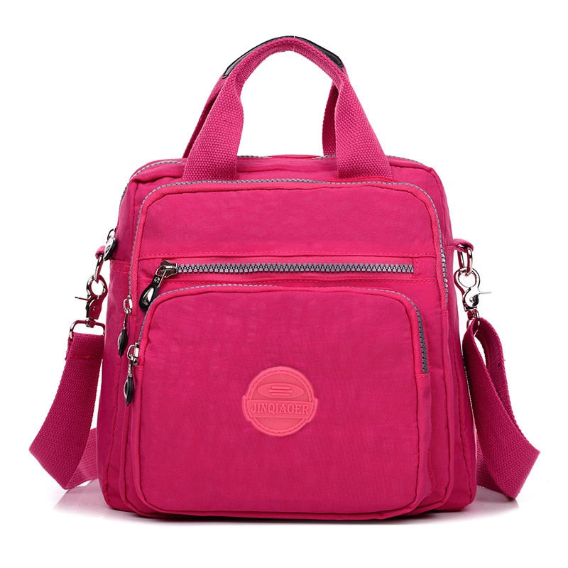 Svart vattentålig nylonväska. Dam Casual Crossbody väska med axelrem, perfekt för vardagsbruk och resor.