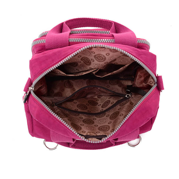 Två Casual Crossbody väskor: en svart och en beige, sida vid sida, jämföra färg och storlek, damväskor.