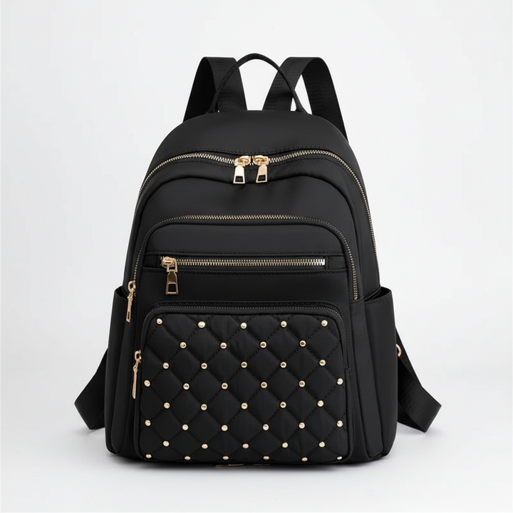 Elegant khakifärgad vattentät ryggsäck i nylon för kvinnor. Funktionell design för skola, arbete och resor.