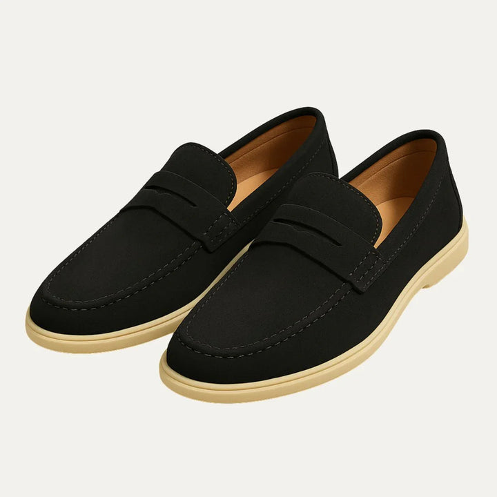 Tidlösa herrskor: Klassiska penny loafers i svart läder. Elegant slip-on modell, idealisk för kontor och fest.