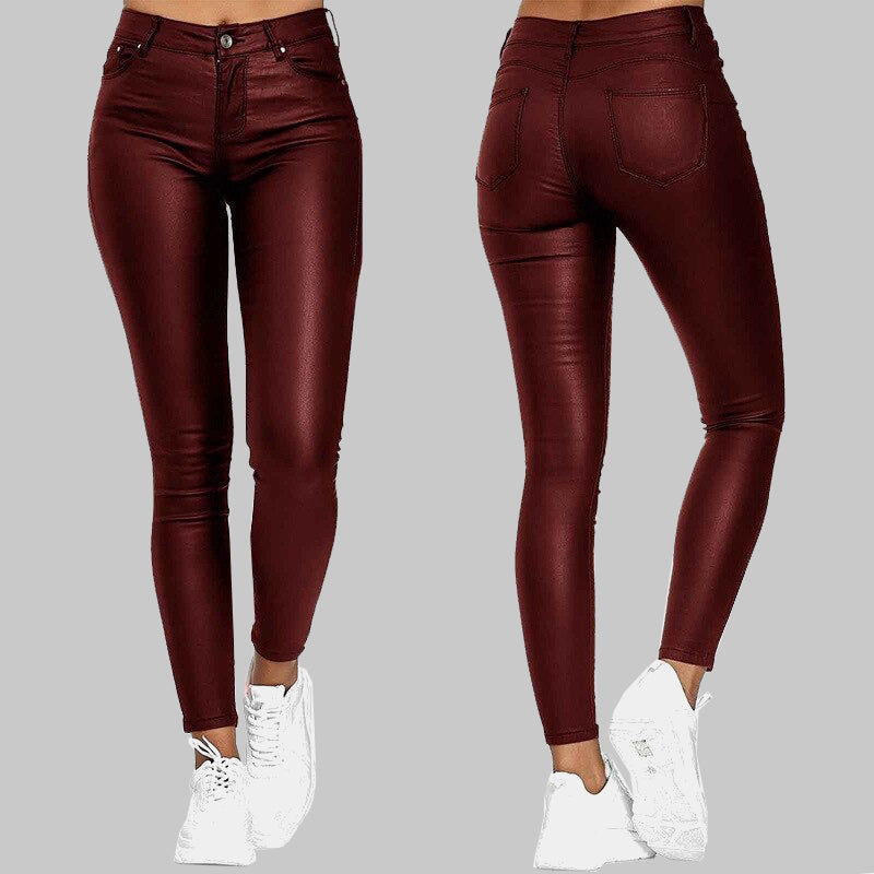 Blå dam stretchbyxor i slim fit konstläder med hög midja, framhäver siluetten.