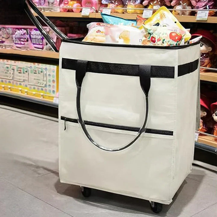 Rymlig Rollex hjulväska, hopfällbar för enkel transport av matkassar och tunga varor.
