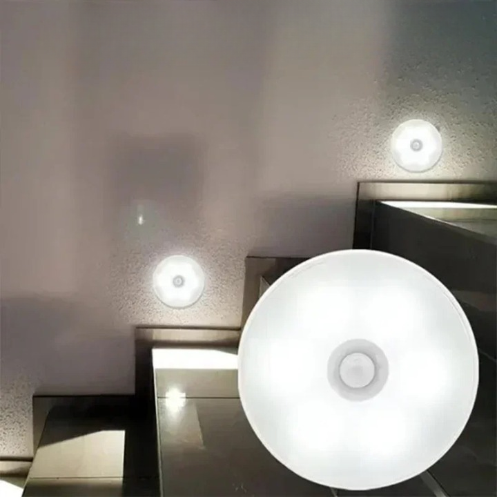 Modern trådlös LED-lampa med stilren design och rörelsesensor. Smart tillägg för heminredning.