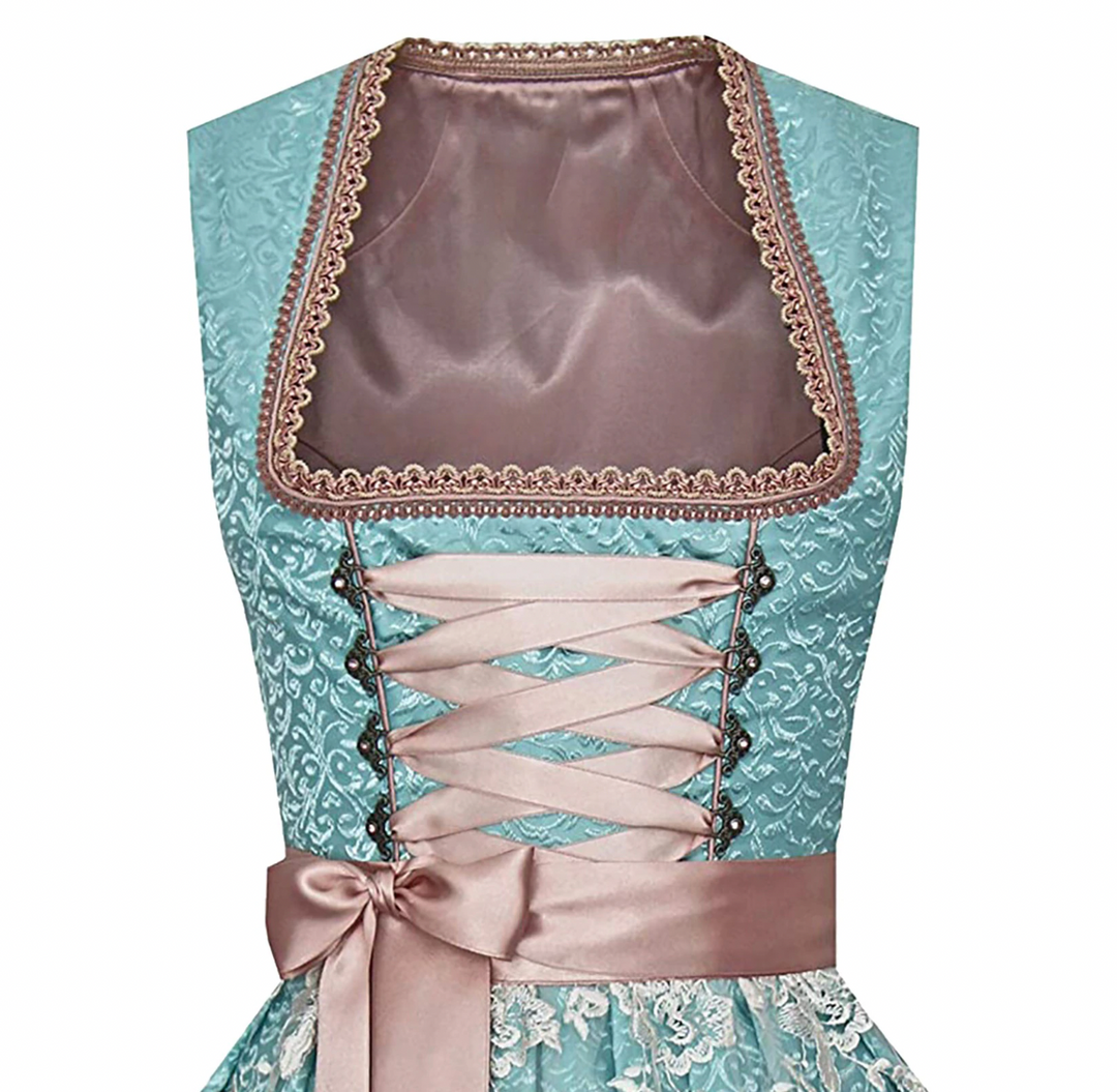 Tvådelad traditionell dirndl klänning med vacker blus. Kulturkläder för kvinnor, perfekt för Oktoberfest.