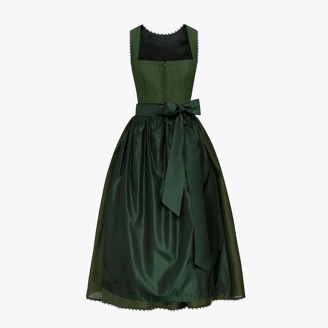 Vacker traditionell dirndl klänning i bayersk stil för Oktoberfest. Kvinnors folkfestklänning med fina detaljer.