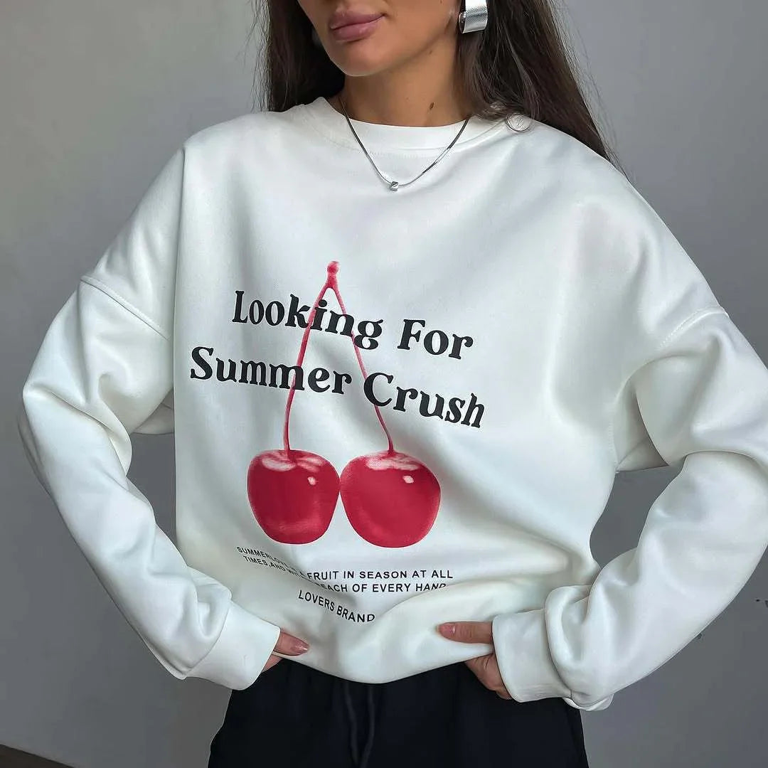 Bekväm dam t-shirt med stilrent grafiskt tryck, avslappnad passform och rund hals för trendigt kvinnomode.