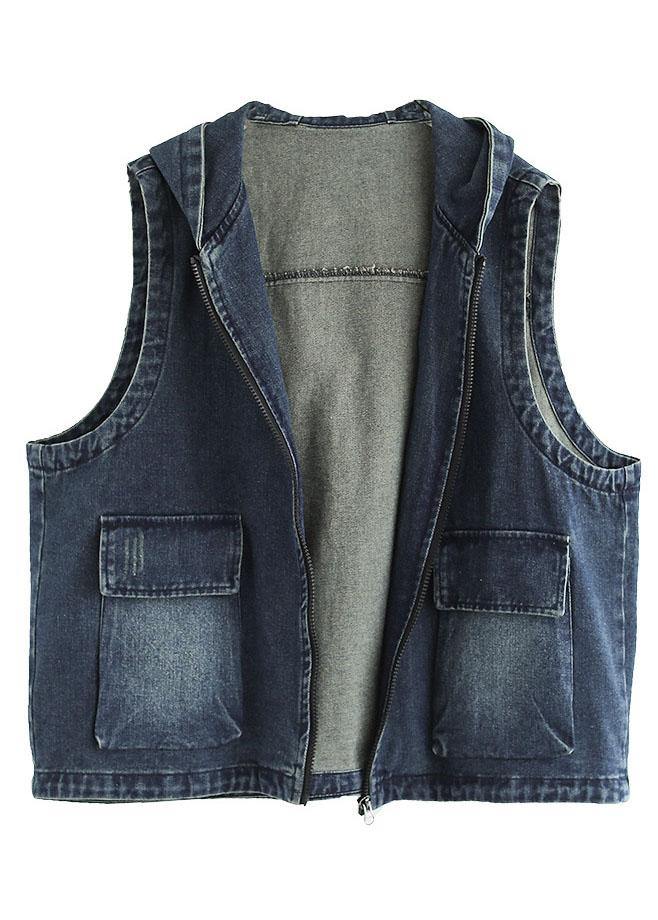 Trendig damväst i denimstil med dragkedjor. Ärmlös casual väst för höstmode och lager-på-lager-look.