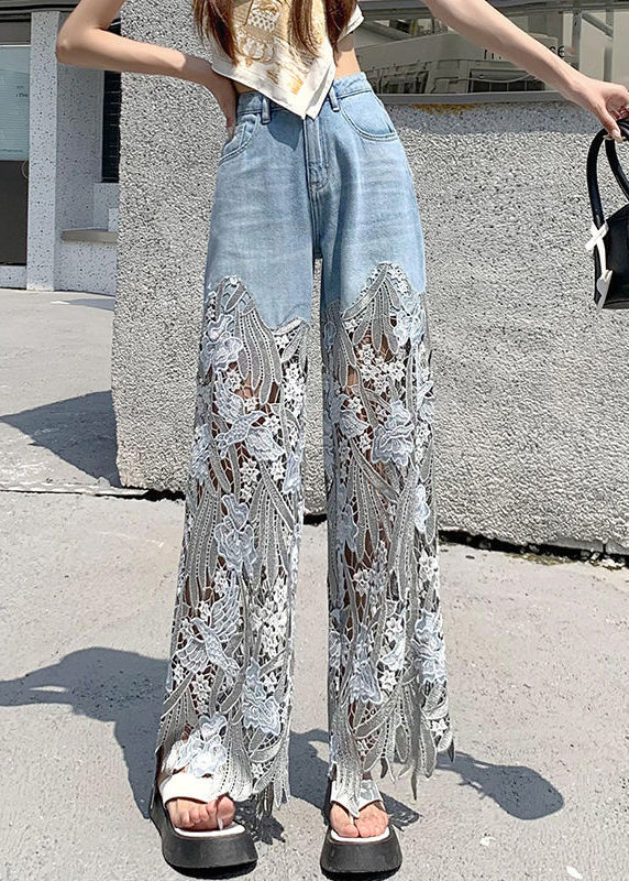 Mode jeans för dam med unika spetsdetaljer och avslappnat patchwork-tryck.