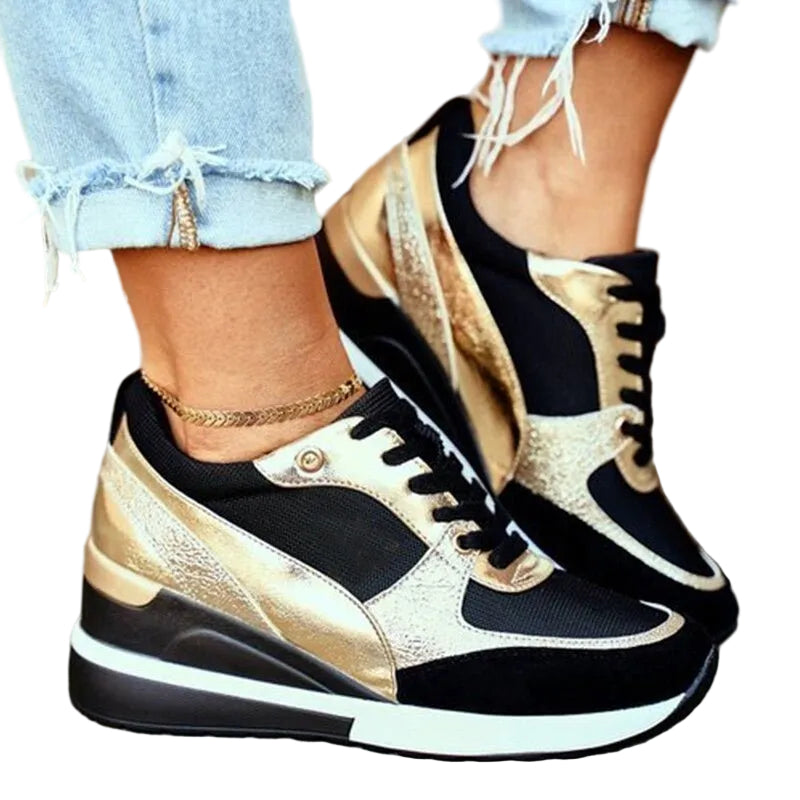 Trendiga kvinnors sneakers med halkfria sulor i en stilren design för vardag och fritid.
