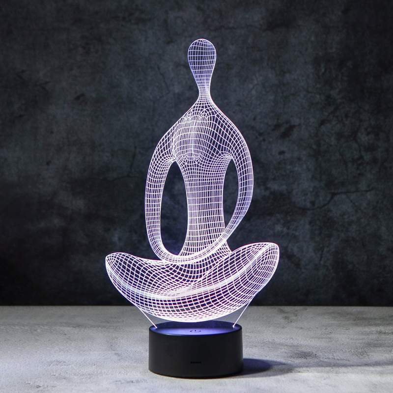 Unik 3D yoga-designlampa i LED som ger stämningsbelysning. Färgskiftande med 7 valbara färger.