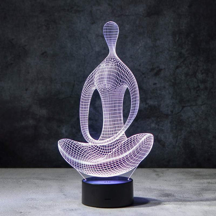 Unik 3D yoga-designlampa i LED som ger stämningsbelysning. Färgskiftande med 7 valbara färger.