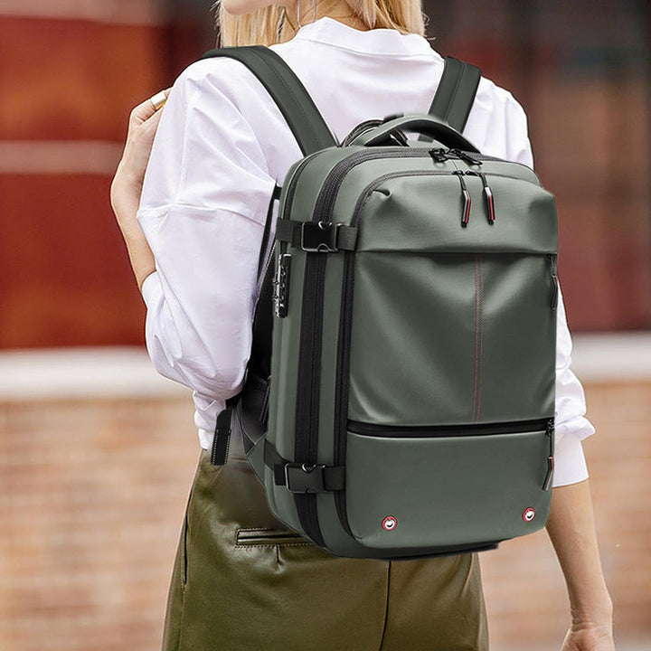 Expanderbar 60L ryggsäck för män/kvinnor. Rymlig resväska med smarta fack och laptopskydd.