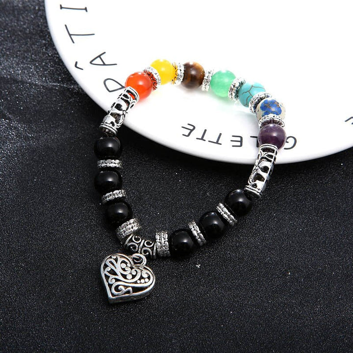 Närbild 7 Chakra armband med pärlor av turkos, grön aventurin och tigeröga