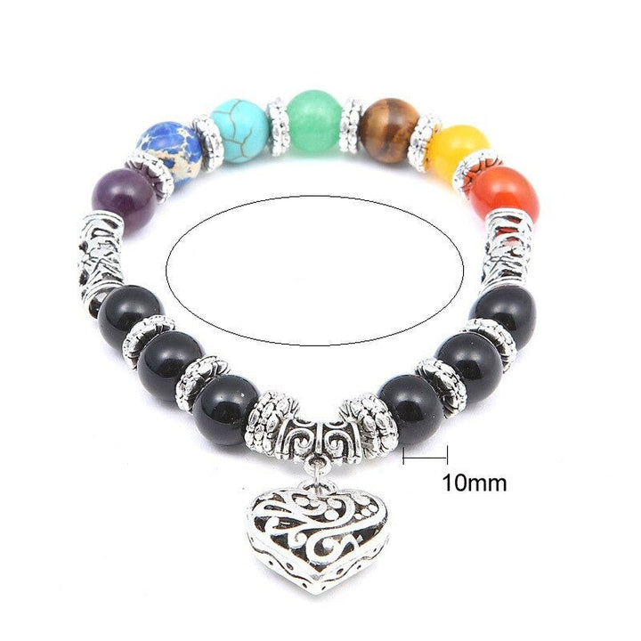 Detaljbild av 7 Chakra unisex armbandets ädelstenar: tigeröga, karneol, röd jaspis