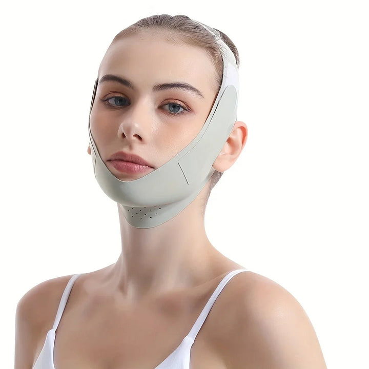 Rosa ansiktsformare för en definierad käklinje. Andningsbar unisex konturmask för daglig ansiktsvård.