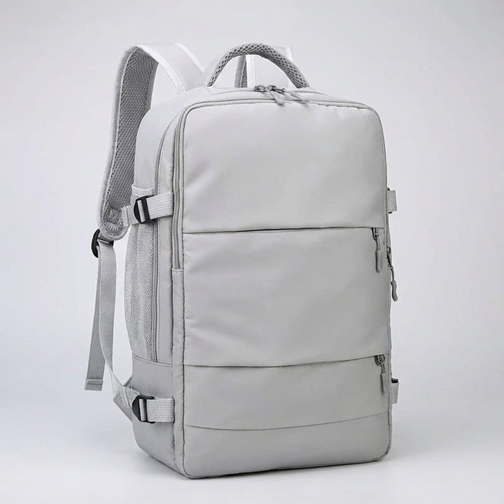 Ergonomisk antistöldryggsäck för resor, med vadderat laptopfack och inbyggd USB-laddningsport.