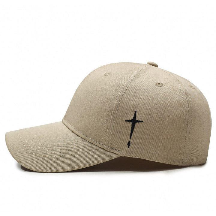 Trendig unisex baseballkeps med cross stil. Justerbar för bästa passform och utmärkt solskydd på fritiden.
