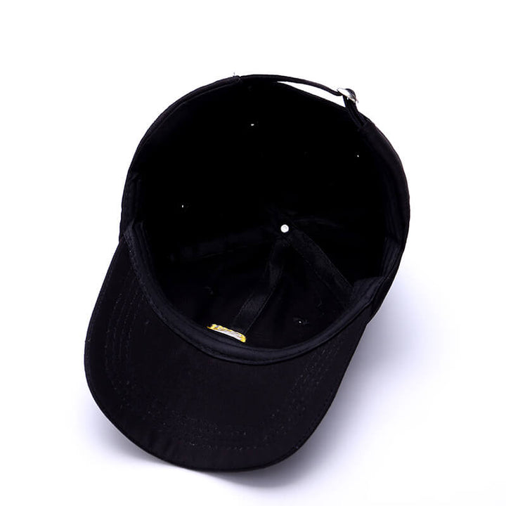 Bekväm unisex bomullskeps, justerbar baseballmodell. En snygg accessoar för soliga dagar.