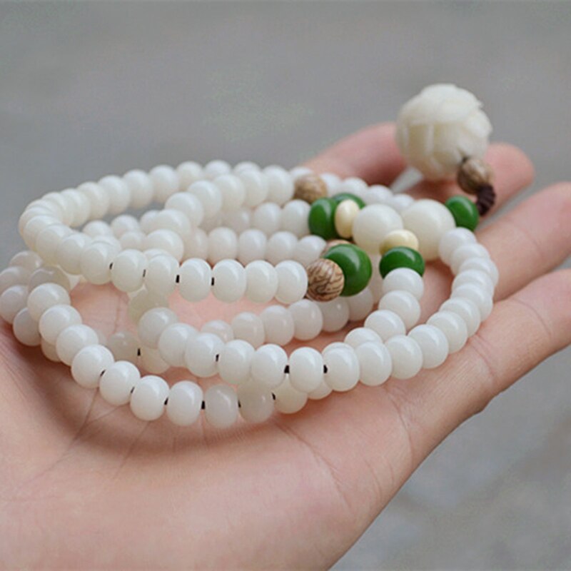 Unisex smyckesarmband med äkta bodhipärlor & lotusblomma. Idealiskt för meditation, yoga & andlig balans.