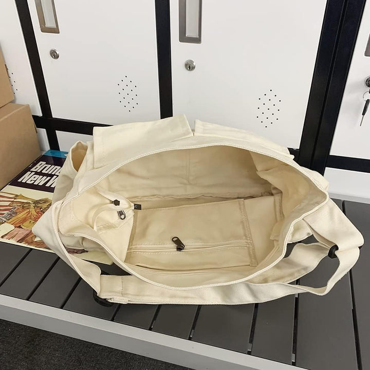 Slitstark canvas crossbody-väska. Robust unisex axelväska för dagligt bruk, idealisk som tålig messengerväska.