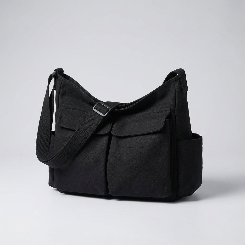 Modern unisex canvas axelväska, stilren och funktionell. Perfekt crossbody-messengerväska för organiserad förvaring.