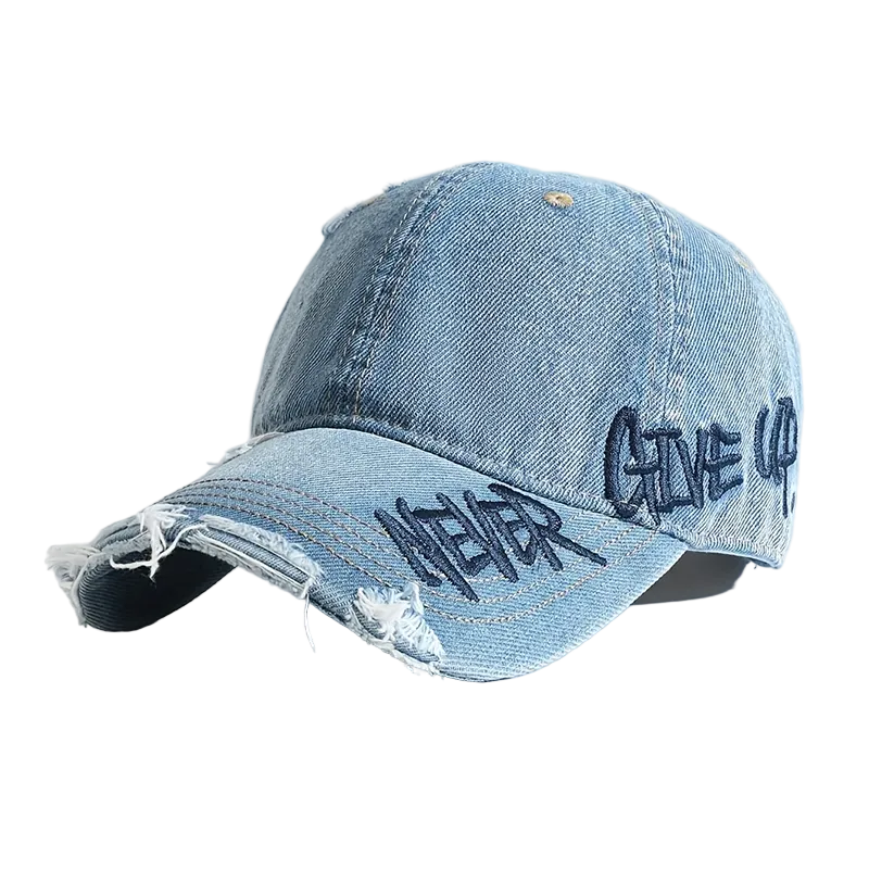 Unisex distressed denim basebollkeps med unik brodyr. En trendig och bekväm streetwear-accessoar.