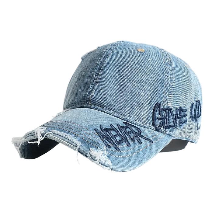 Unisex distressed denim basebollkeps med unik brodyr. En trendig och bekväm streetwear-accessoar.